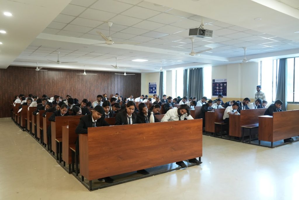 University students in a classroom, representing TU exam form notice